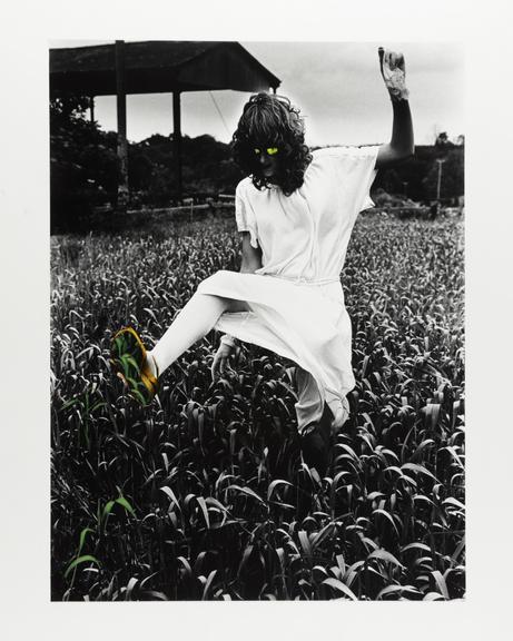 Hand-coloured photographic portrait of Nicky Danby in a field