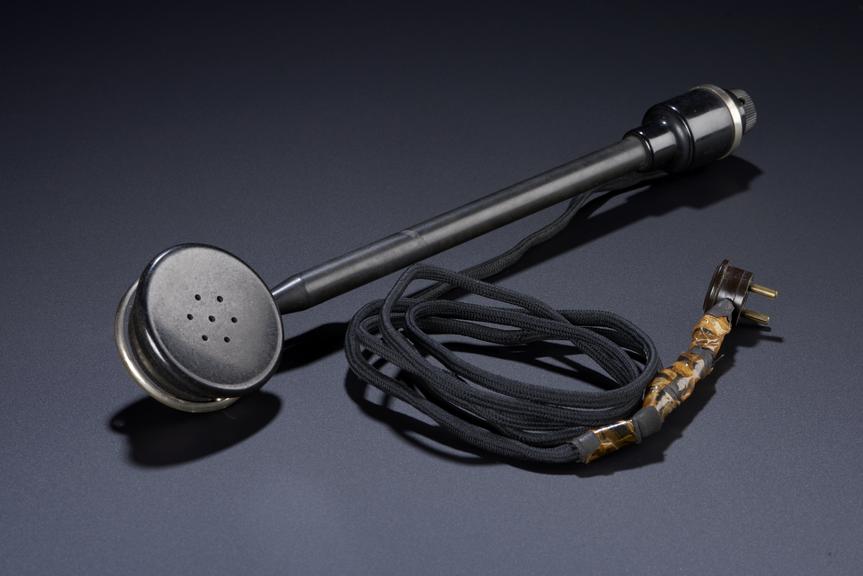 SG Brown handheld earpiece