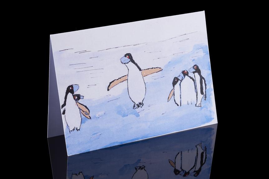 Christmas card showing six penguins wearing face coverings