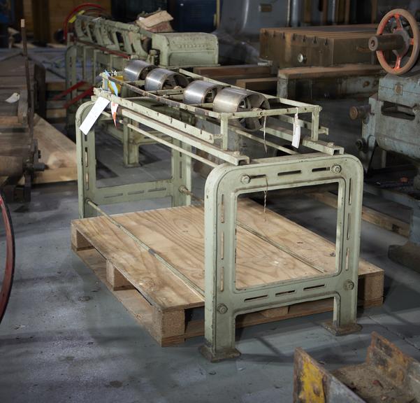 Part of smallware warping machine. Has 4 rollers in central section