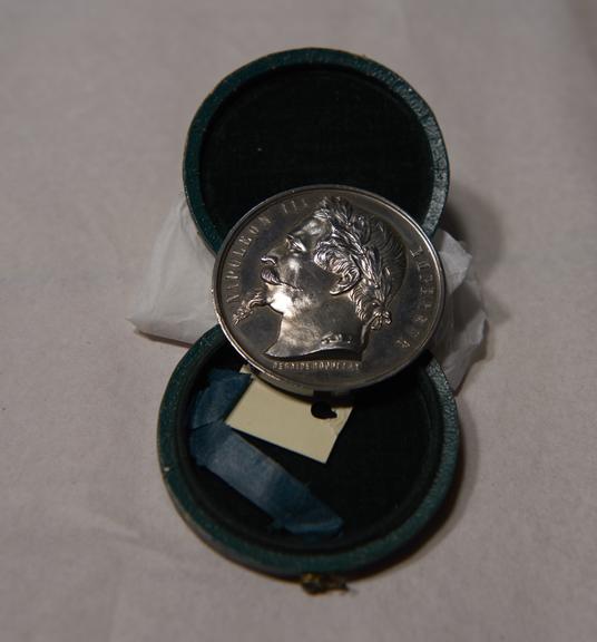 Silver-Coloured Circular Metal Medal, in Green Circular Case, Won by James Moore