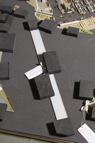 Translucent Strip of Acrylic from Beneath Clear Acrylic Block with Black Painted Chamfered Sides, Denoting a Break in the Model of 14 Miles of Industrial River, from Model Showing the 5 Dock Systems of the Port of London