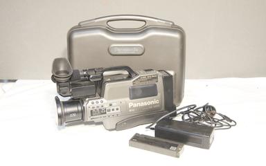 Panasonic svhs ms4 camera in case.