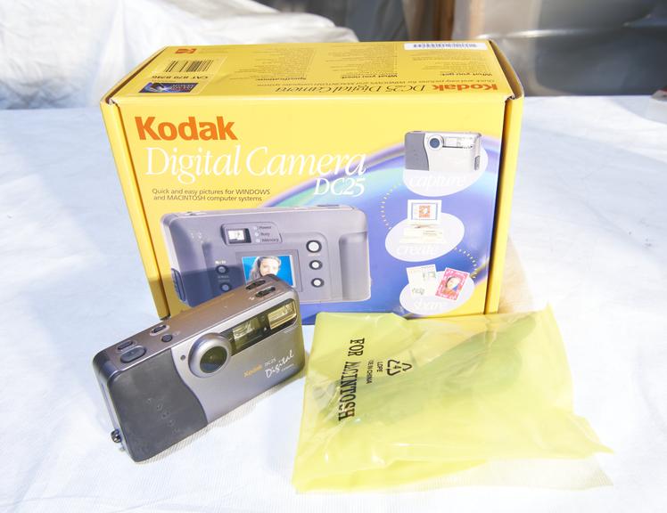 Kodak DC-25 digital camera with original packaging.