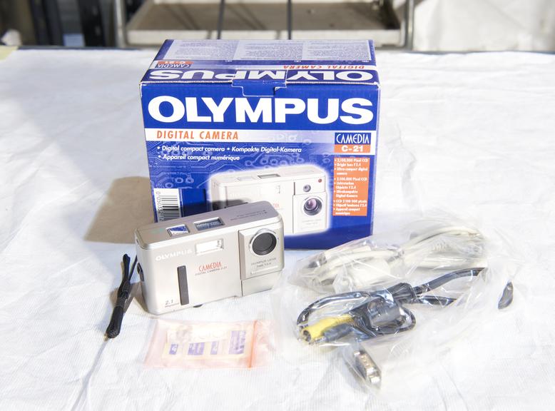 Olympus C-21 digital camera with original packaging