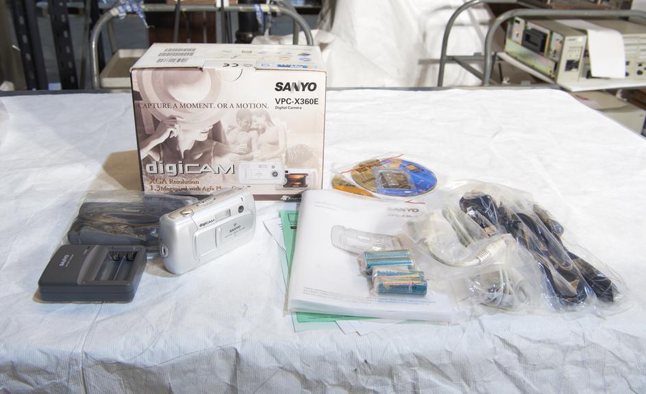 Sanyo VPC-X360E digital camera with original packaging.