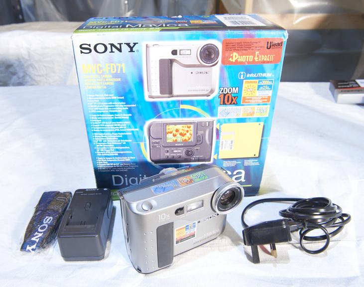 Sony MVC-FD71 digital camera with original packaging.