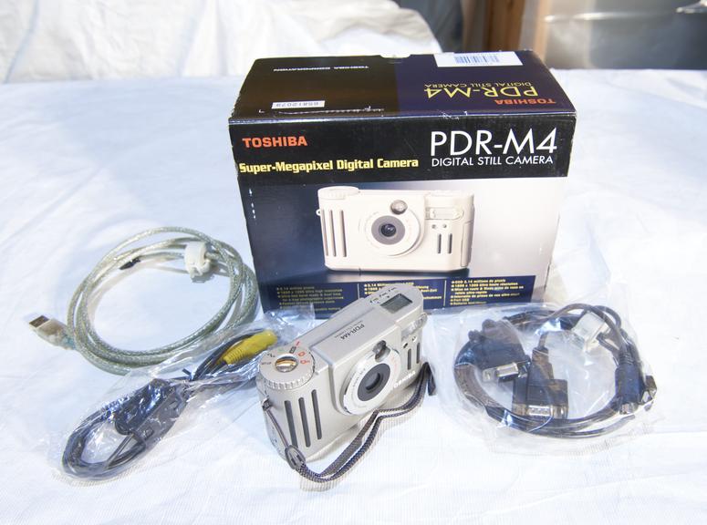 Toshiba PDR-M4 digital camera with original packaging.