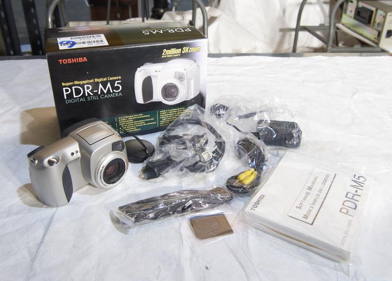 Toshiba PDR-M5 digital camera with original packaging.