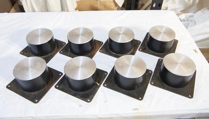 Eight metal discs from Beamline 16.5 of the Synchrotron Radiation Laboratory