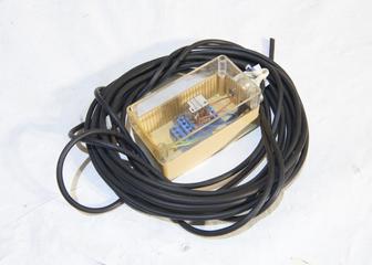 Clear plastic power unit with attached wiring from Beamline 16