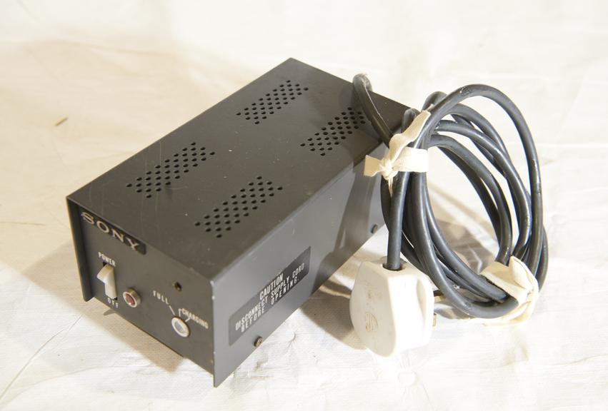 Sony battery charger. Model BC-2400B. Serial 3515. Owned and used by the surgeon Sir Terence Cawthorne