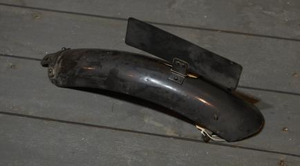 Mudguard with blank registration plate bracket