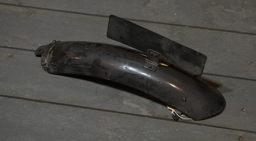 Mudguard with blank registration plate bracket