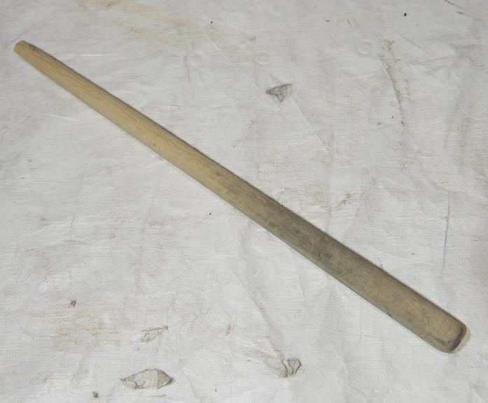 wooden stick used to stir clothing whilst washing in wash boiler.