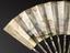 One fan. Ivory, carved sticks, silver inlay; painted panels