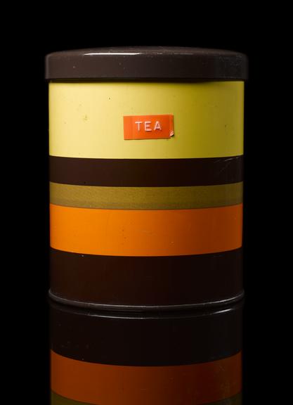 Orange, yellow and brown striped container for tea, English