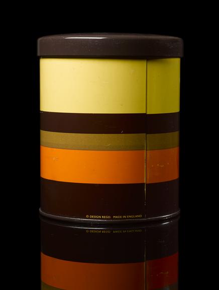 Orange, yellow and brown striped container for tea, English