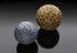 Pair of carpet bowls,one of earthenware