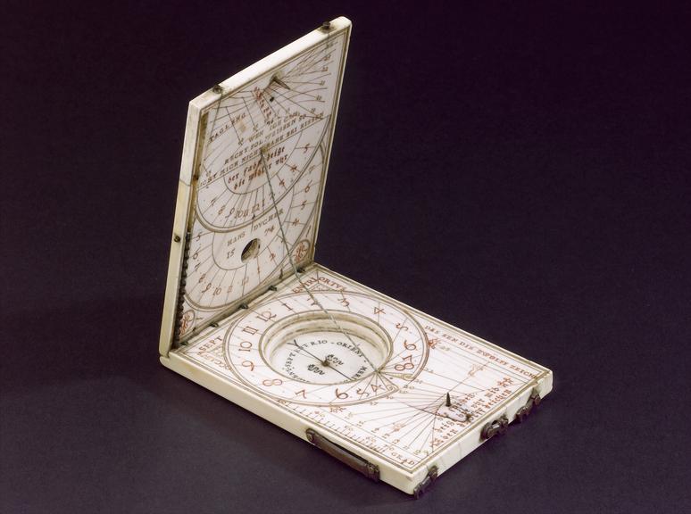 Ivory tablet compass sundial; 3 3/4 x 2 3/8 x 7/16-inches. Made by Hans ...