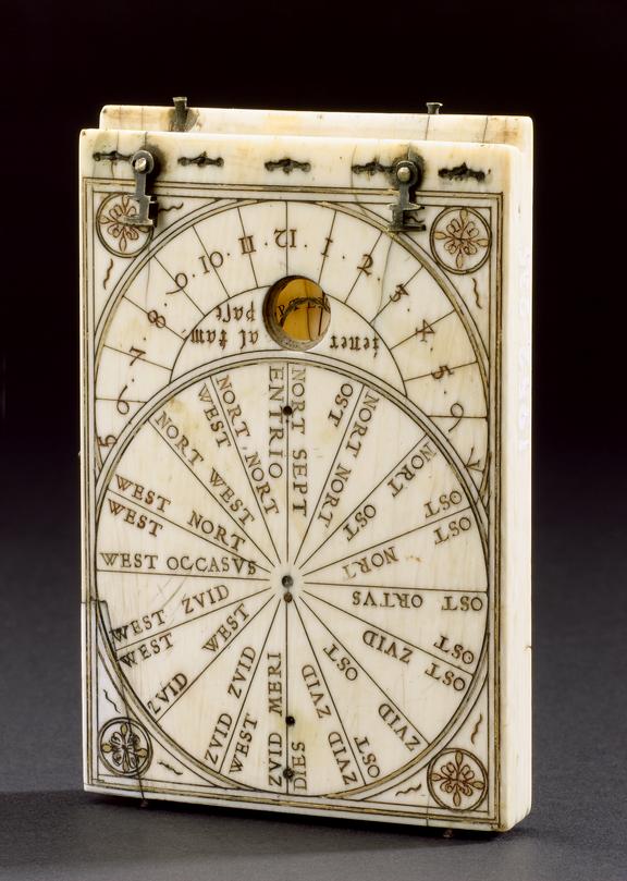 Ivory tablet compass sundial; 3 3/4 x 2 3/8 x 7/16-inches. Made by Hans ...