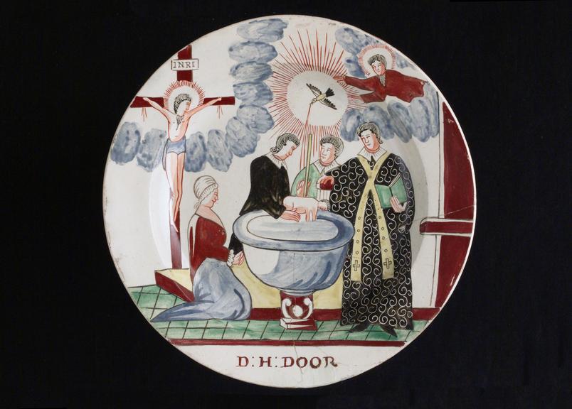 Creamware plate, painted overglaze scene of a baptism