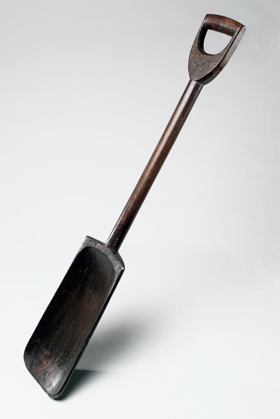 Wooden winnowing shovel.