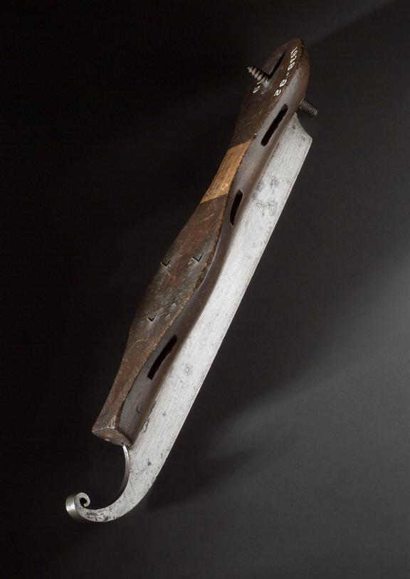 Ice-skate of about 1830, wood with metal runner