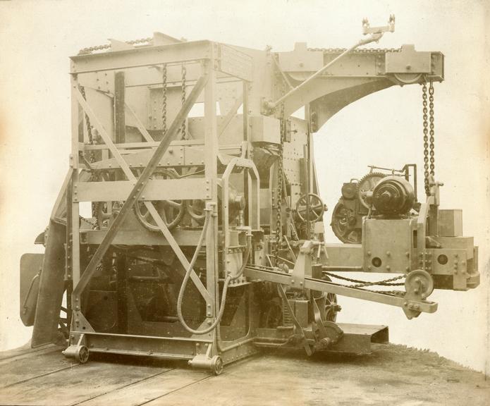 Photograph of West's electrically driven combined charging and drawing machine