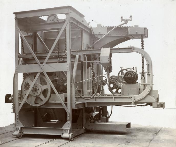 Photograph of West's electrically driven combined charging and discharging machine