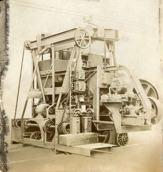 Photograph of West's electrically driven combined charging and drawing machine