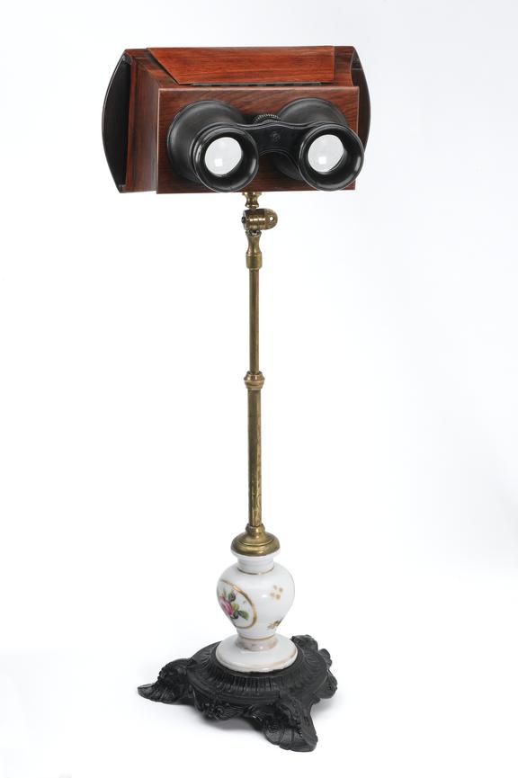 Table stereoscope, brass with cast metal base.