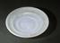 Circular saucer of pale blue and clear marbled polystyrene (coffee saucer; toy)