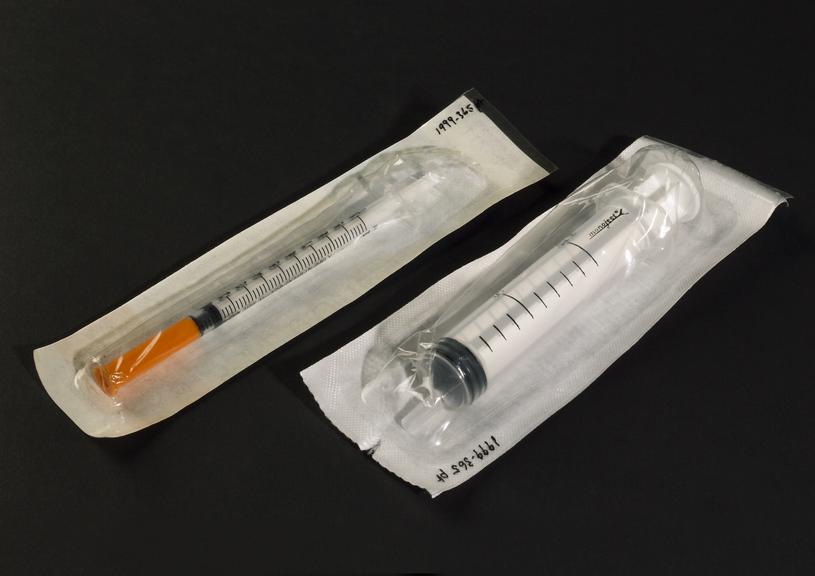 Bag of disposable syringes and needles in sterile packs