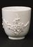 Small white cup in soft paste porcelain