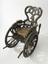 Carved wooden wheelchair, Europe, 1850-1890 (invalid chair)