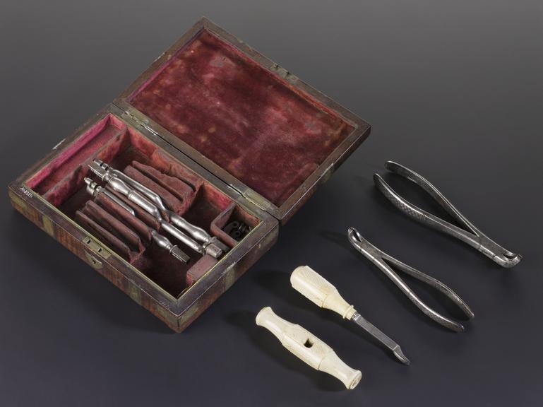 Dental instrument set in rectangular case, by Weiss, London