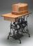 Treadle sewing machine sold by Harris Ltd, a London retail firm