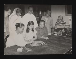 A photograph of Ayahs and Amahs playing Ludo at the Ayah's Home in Hackney
