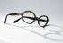Pair of brown plastic spectacle frames with gold trim
