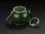 Green ceramic tea pot