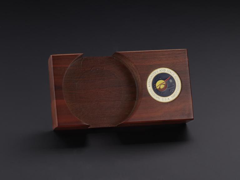 Wooden presentation and storage block for NASA coasters
