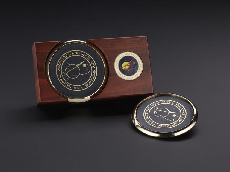 Wooden presentation and storage block for NASA coasters