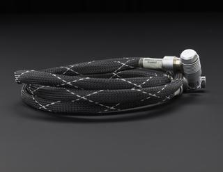 Cable in black and white mesh with metal connectors
