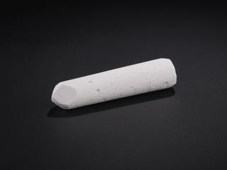 One large stick of pink chalk