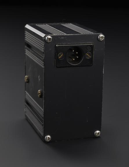 Black metal box with XLR4 to XLR 5 connectors