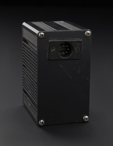 Black metal box with XLR4 to XLR 5 connectors