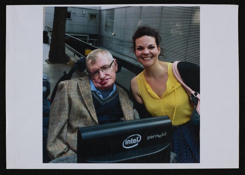 Photograph of Stephen Hawking with opera singer Rena Hams