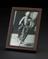 Framed photograph of Albert Einstein on a bicycle