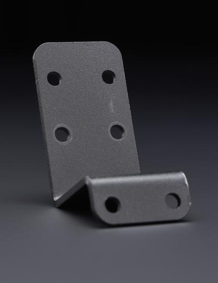 Metal bracket for wheelchair support